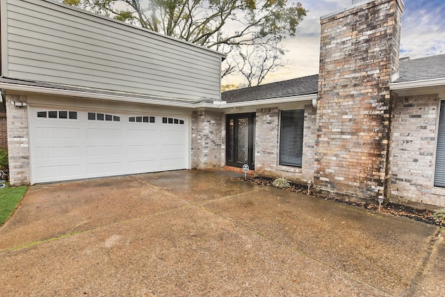 exterior space featuring a garage