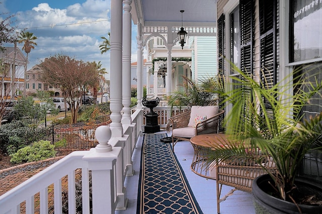 balcony featuring covered porch