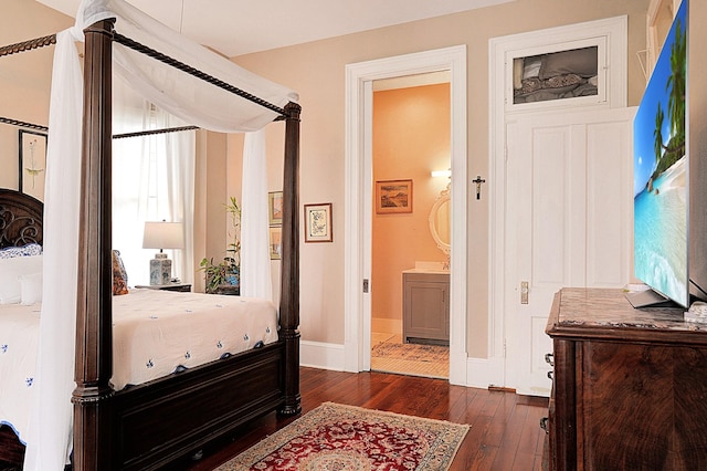 bedroom featuring dark hardwood / wood-style floors