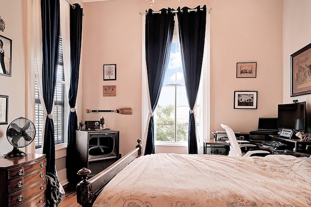 bedroom featuring wood-type flooring