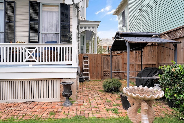 view of patio with a balcony