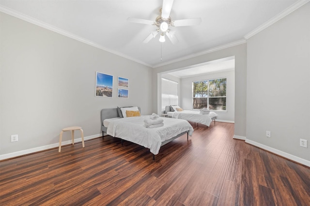 bedroom featuring crown molding, dark hardwood / wood-style floors, and ceiling fan