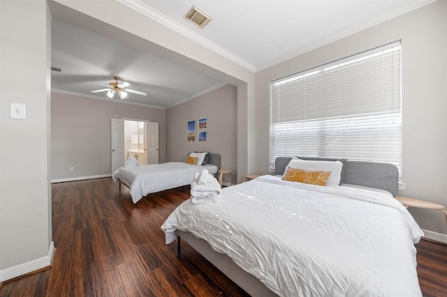 bedroom featuring dark wood-type flooring, ceiling fan, crown molding, and ensuite bath