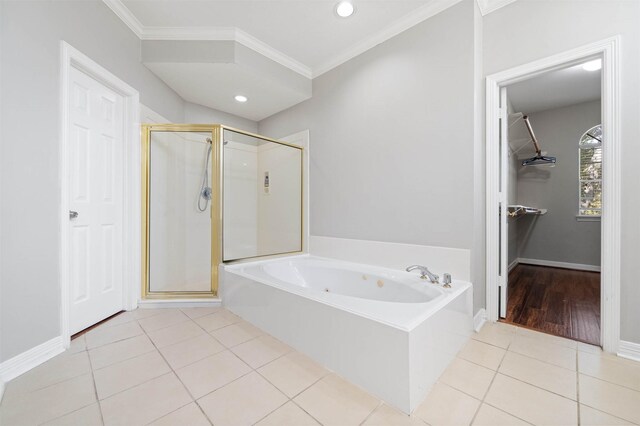 bathroom featuring ornamental molding, plus walk in shower, and tile patterned flooring