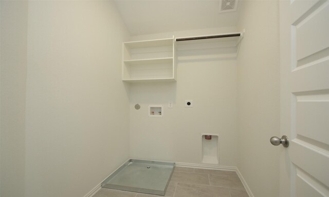 washroom with electric dryer hookup, baseboards, visible vents, laundry area, and hookup for a washing machine