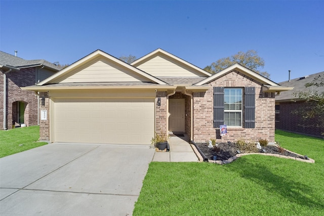 view of front of home featuring a garage and a front lawn