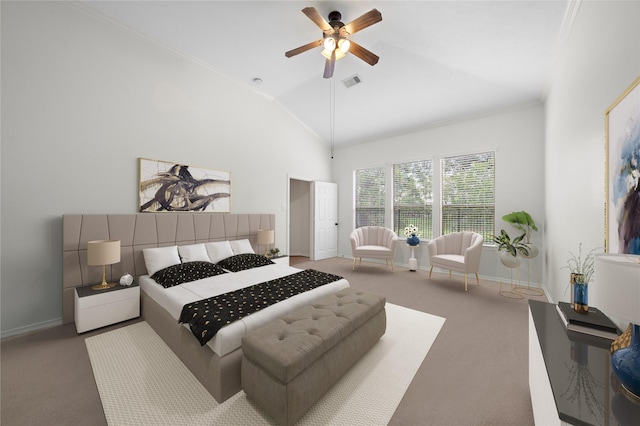 bedroom featuring ceiling fan, ornamental molding, vaulted ceiling, and carpet