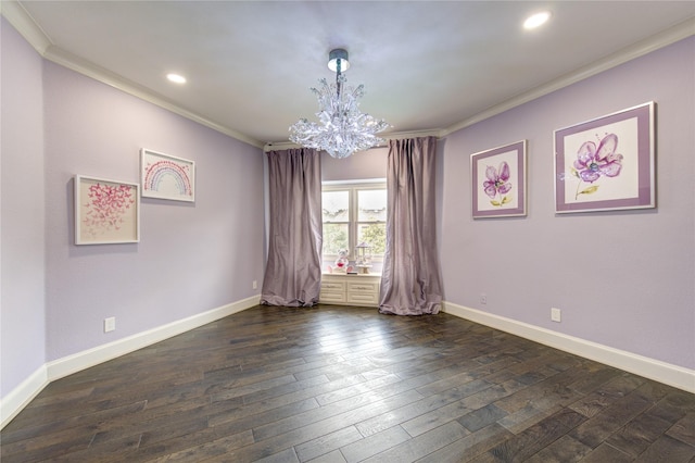 spare room with ornamental molding, a notable chandelier, and dark hardwood / wood-style flooring