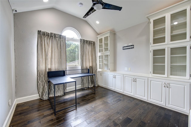 office with ceiling fan, dark hardwood / wood-style floors, and vaulted ceiling