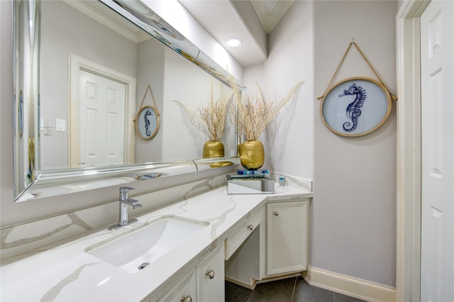 bathroom with vanity and tile patterned flooring