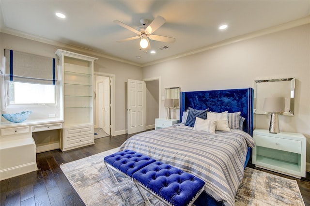 bedroom with dark wood-type flooring, built in desk, ornamental molding, and ceiling fan