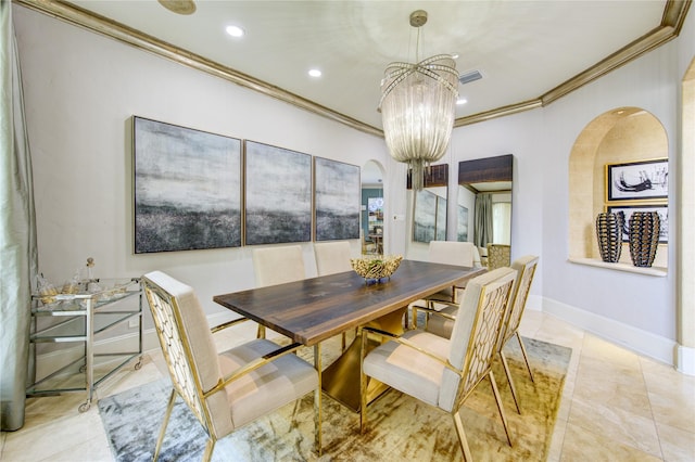 tiled dining space featuring crown molding and an inviting chandelier