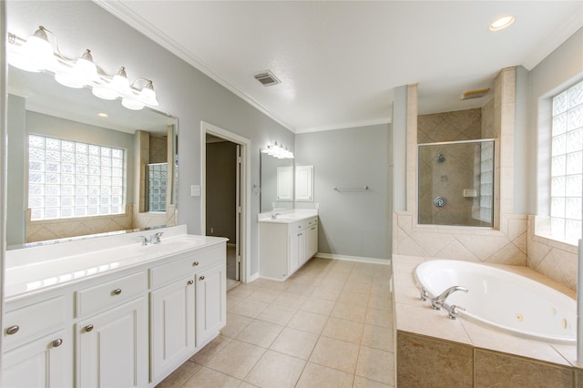 bathroom with vanity, tile patterned floors, ornamental molding, and shower with separate bathtub