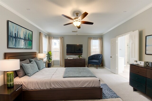 bedroom with light carpet, crown molding, and ceiling fan