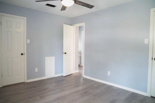 unfurnished bedroom featuring hardwood / wood-style flooring and ceiling fan