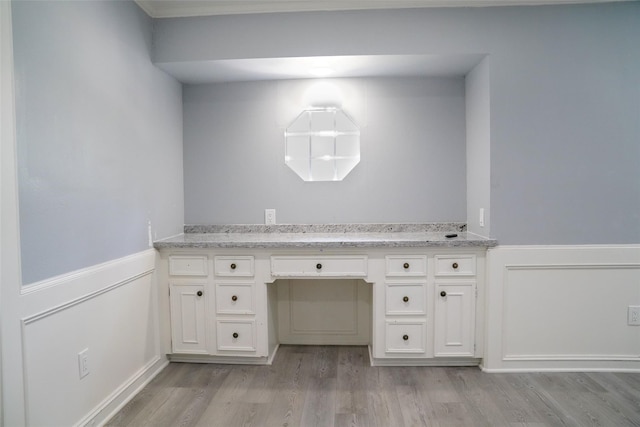 bathroom with wood-type flooring and vanity