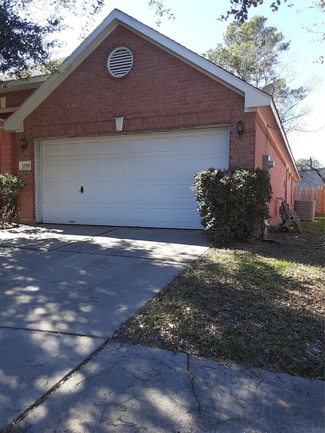 view of home's exterior featuring an outbuilding and a garage