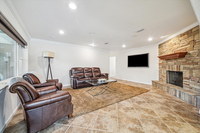 living room with ornamental molding and a fireplace