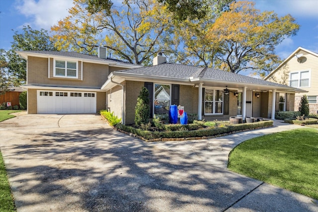 view of front of home with a garage and a porch