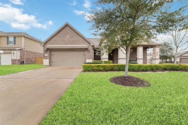 view of front facade featuring a garage and a front lawn