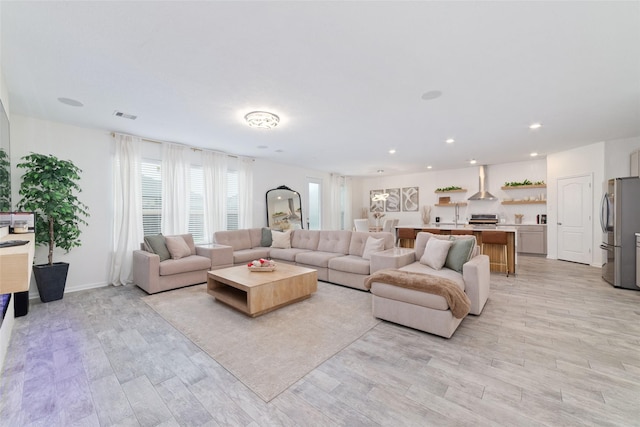 living room featuring light wood-type flooring