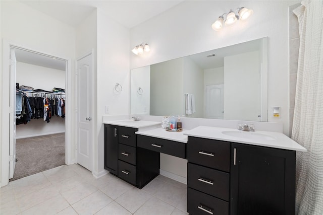 bathroom featuring vanity and tile patterned flooring