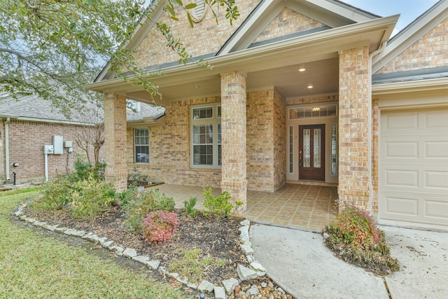 doorway to property featuring a garage