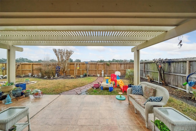 view of patio with a pergola and a playground