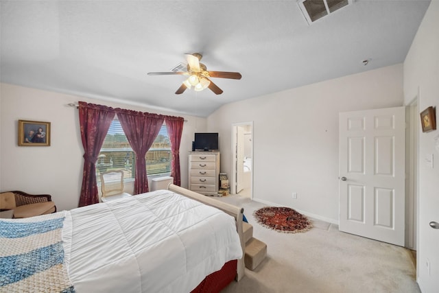 carpeted bedroom featuring ceiling fan and vaulted ceiling