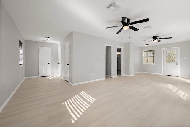 interior space featuring ceiling fan and light wood-type flooring