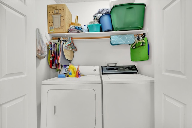 washroom featuring independent washer and dryer