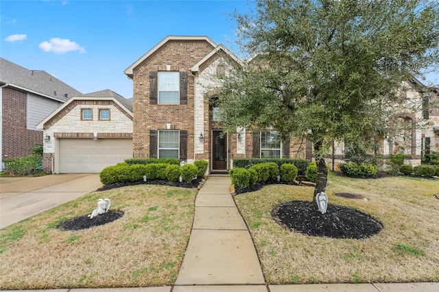 traditional-style home with a front lawn, brick siding, driveway, and an attached garage