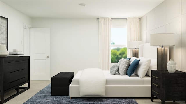 bedroom with light colored carpet