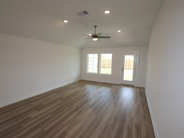 26224 Astral Way, La Marque, TX 77568 - empty room with lofted ceiling, baseboards, a ceiling fan, dark wood-style flooring, and recessed lighting