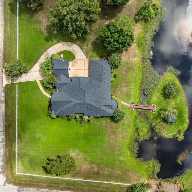 bird's eye view with a water view