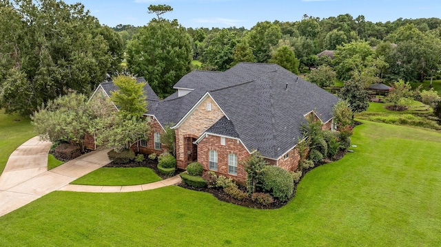 exterior space with a front lawn