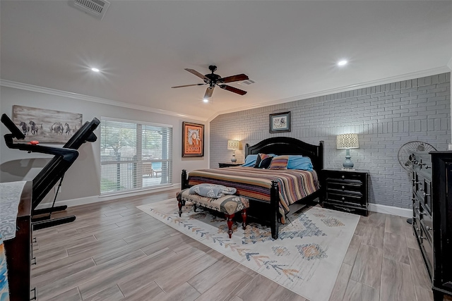 bedroom with crown molding, brick wall, ceiling fan, and light hardwood / wood-style flooring