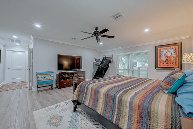 bedroom featuring ornamental molding, light hardwood / wood-style floors, and ceiling fan