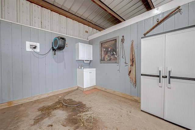 bathroom with concrete flooring