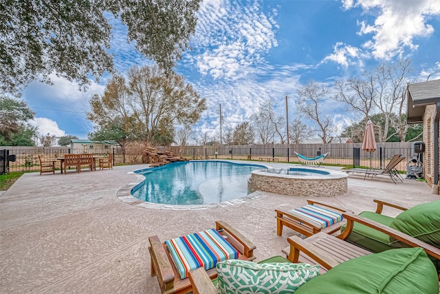 view of swimming pool with an in ground hot tub, an outdoor hangout area, and a patio