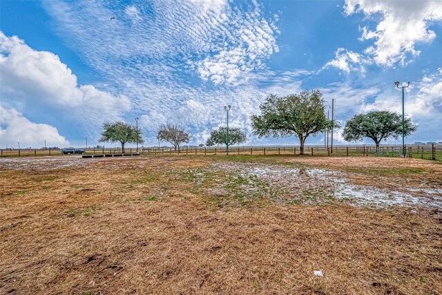 view of yard featuring a rural view