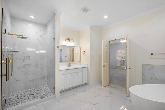 bathroom featuring vanity, ornamental molding, and separate shower and tub