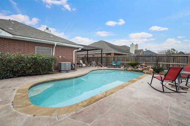 view of swimming pool featuring a pergola and a patio