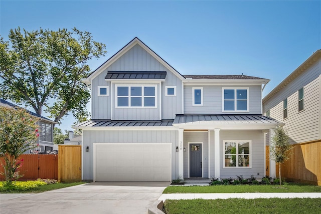 modern inspired farmhouse with a garage