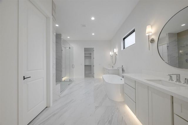 bathroom featuring shower with separate bathtub and vanity