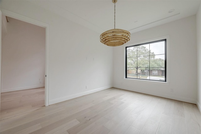 unfurnished room with light hardwood / wood-style floors