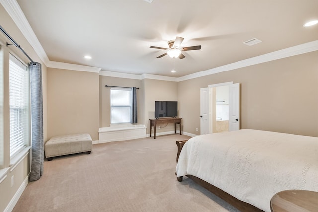 carpeted bedroom featuring crown molding and ceiling fan