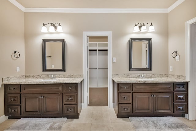 bathroom featuring vanity, crown molding, and tile patterned floors