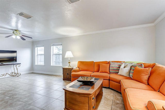 tiled living room featuring crown molding and ceiling fan