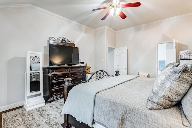 bedroom featuring ornamental molding and ceiling fan